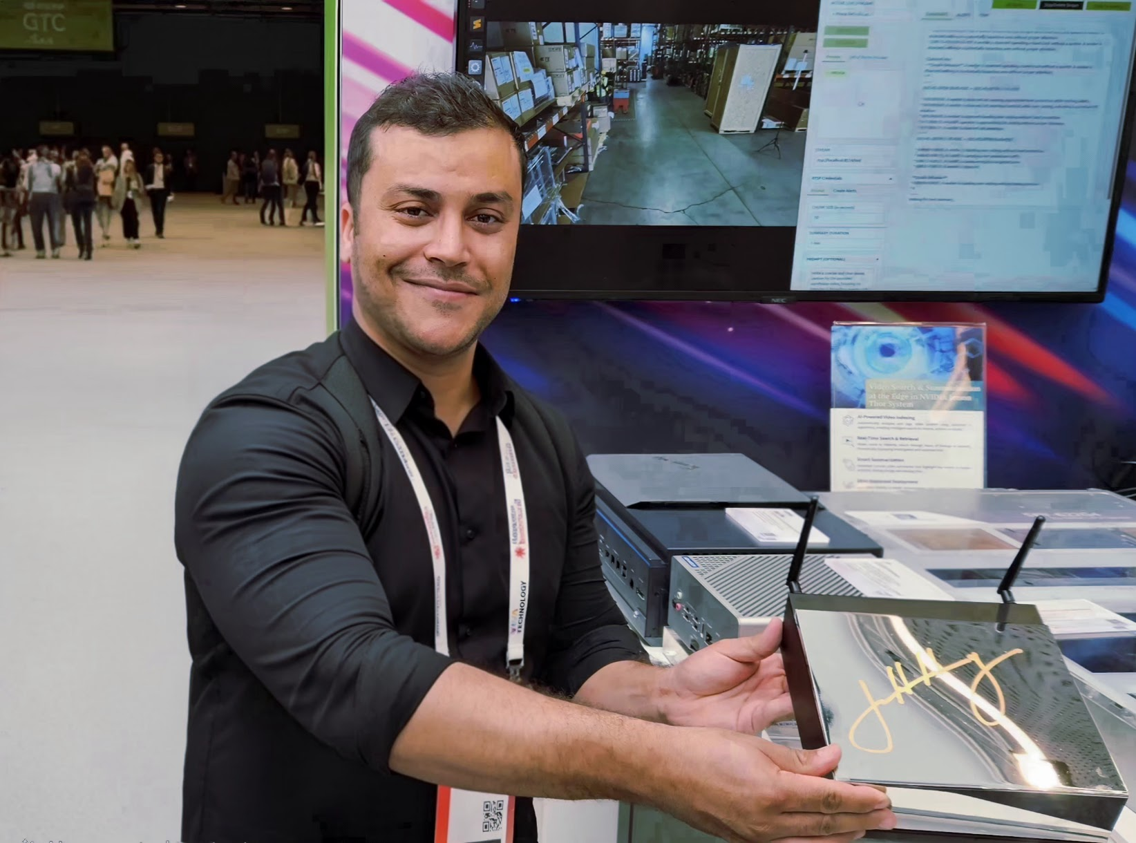 CEO and Co-founder at GTC Paris holding Jetson Thor signer by Nvidia CEO